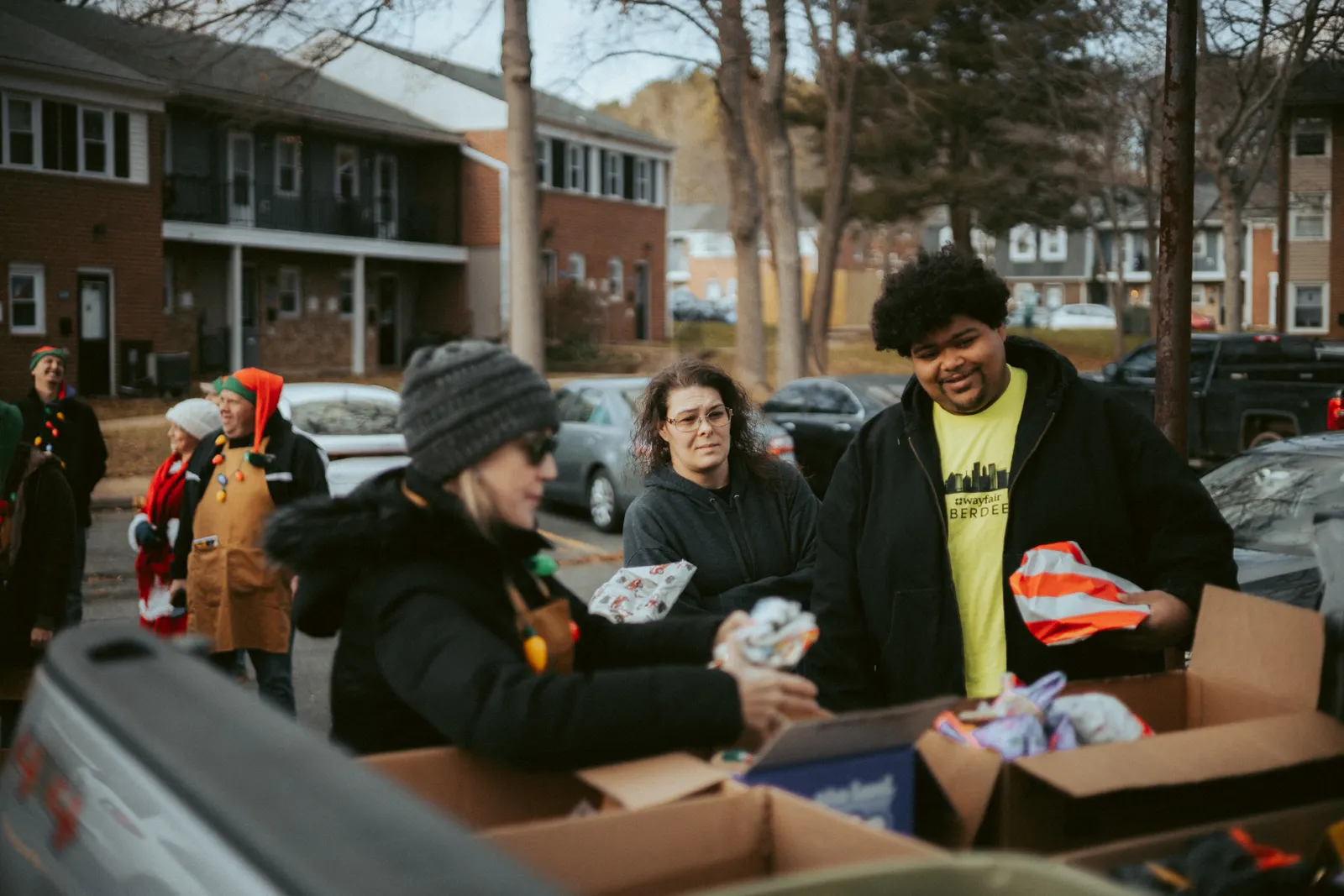 Volunteers preparing seasonal charity gifts